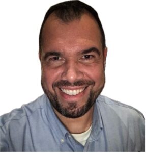 Head shop picture of Dr. Benatti in a blue button up shirt.